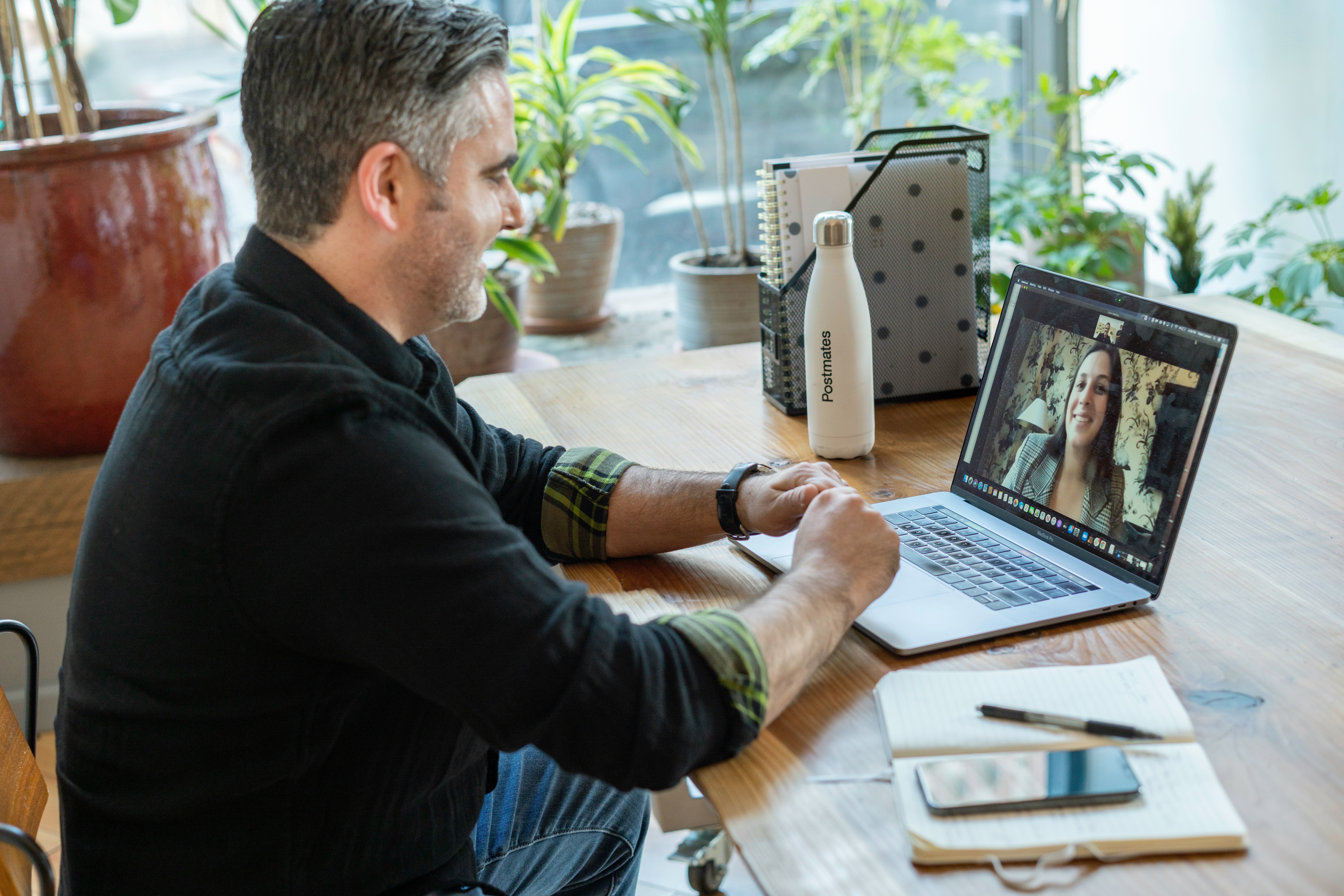 man and woman on a zoom call